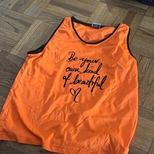 “Be your own kind of beautiful” size m orange jersey tank (loose fit)